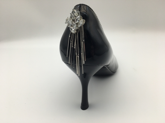 As sapatas de vestido das mulheres pretas do couro envernizado, apontaram Toe Stiletto Heels